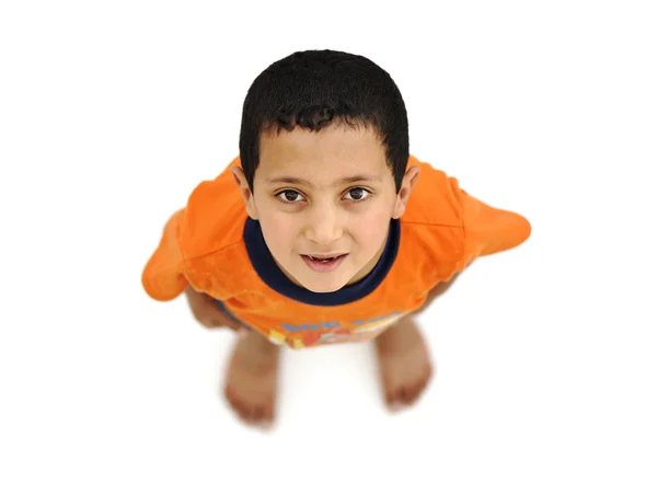 Ευτυχισμένο παιδί, θετική φρέσκο μικρό αγόρι από ψηλά, διαφορετική οπτική γωνία, απομόνωση 免版税图库图片