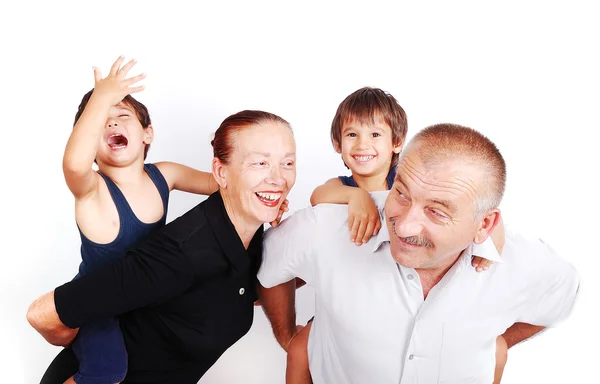 Šťastná rodina se čtyřmi členy v bílém pozadí Stock Obrázky