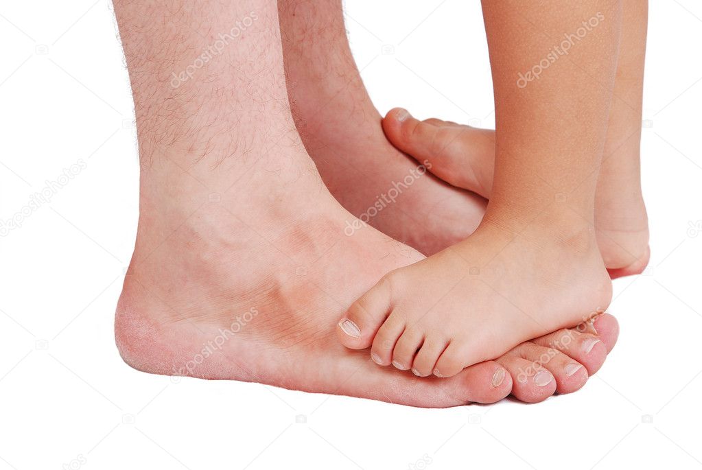 Two pairs of legs, very small on very big Stock Photo by ©zurijeta 8844186