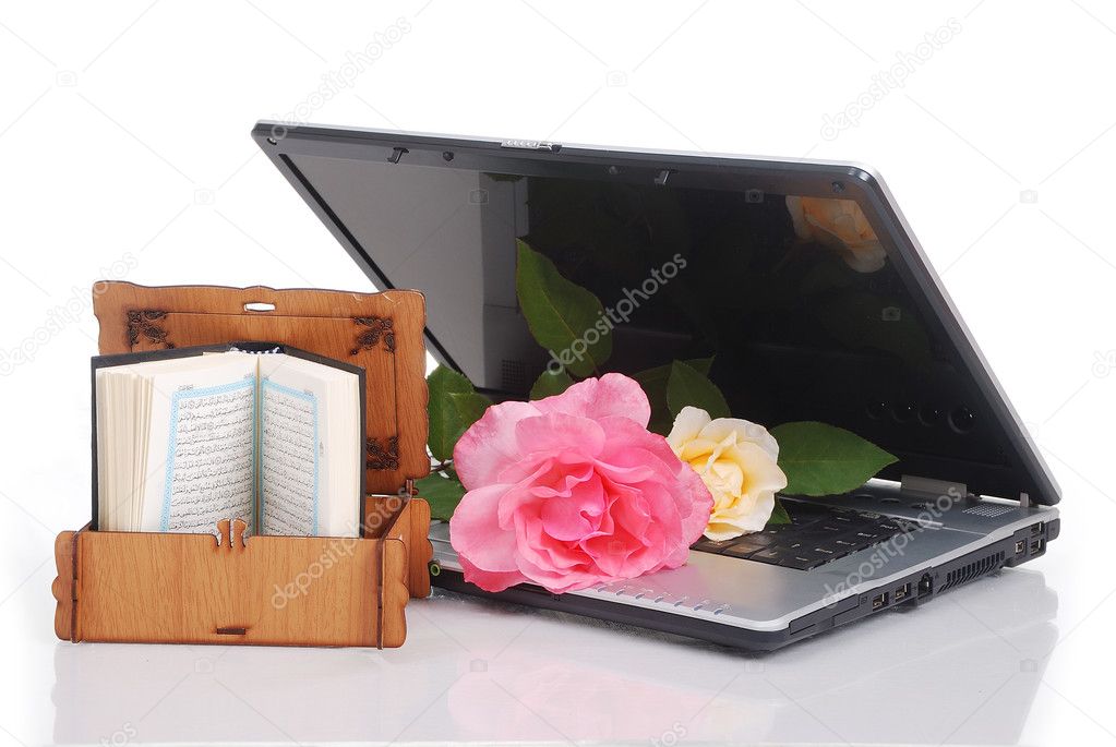 Beautiful roses, laptop and Islam holy book, put together isolated