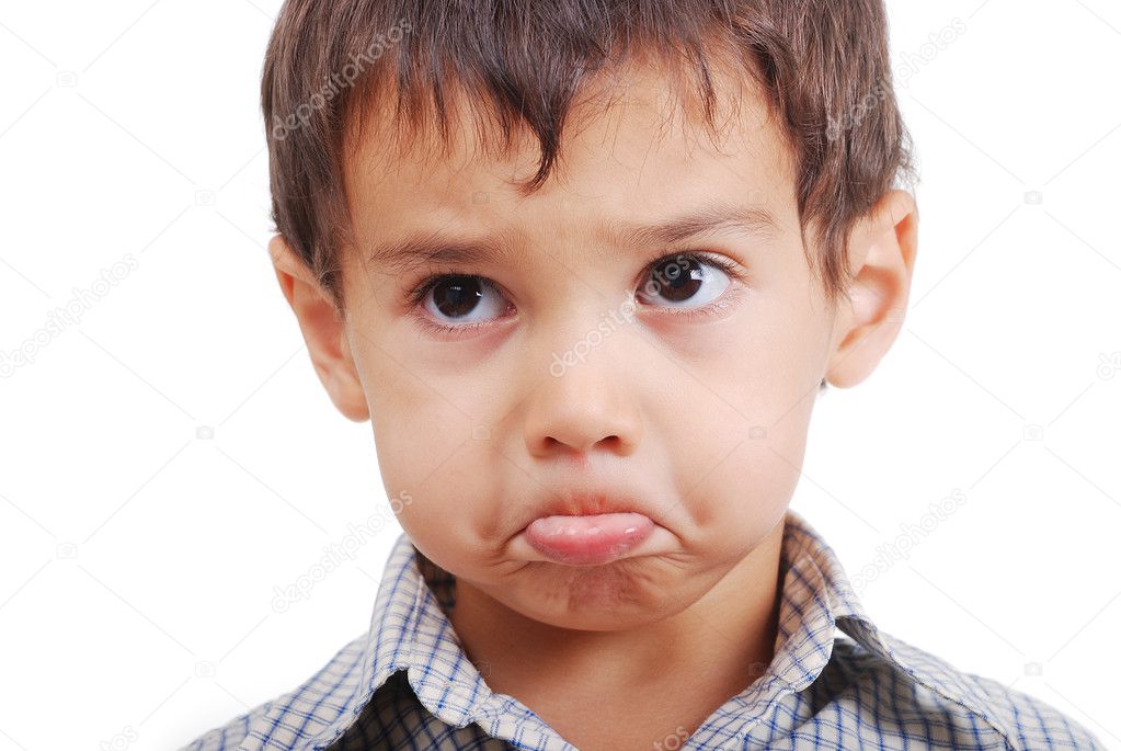 Very cute little boy with funny expression on face