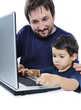 Father and son on laptop clipart