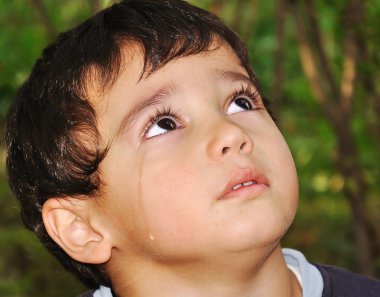 Very cute kid crying with true emotional tears clipart