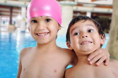 Little cute children on pool clipart