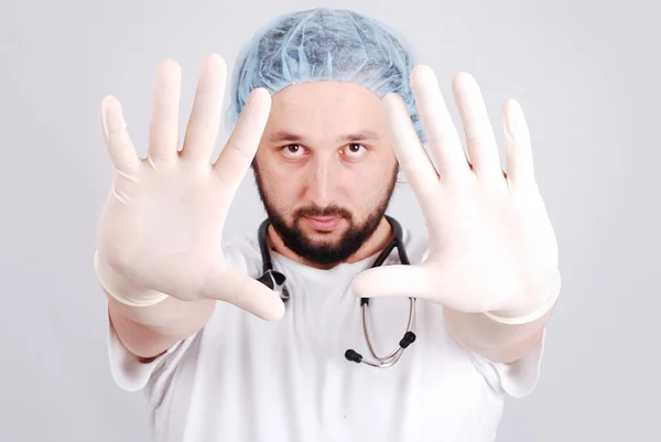 Jovem médico masculino em branco — Fotografia de Stock