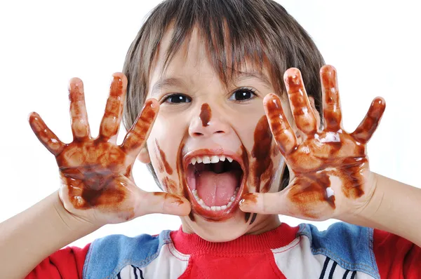 Brincando com chocolate — Fotografia de Stock