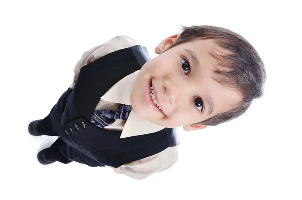 Маленький милый парень в деловом костюме изолирован — стоковое фото