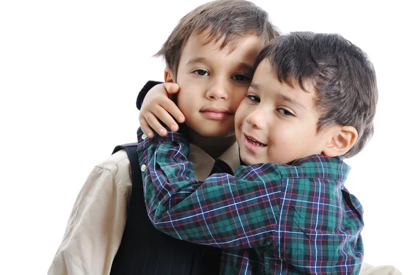 Bambini felici con vestiti alla moda isolati — Foto Stock