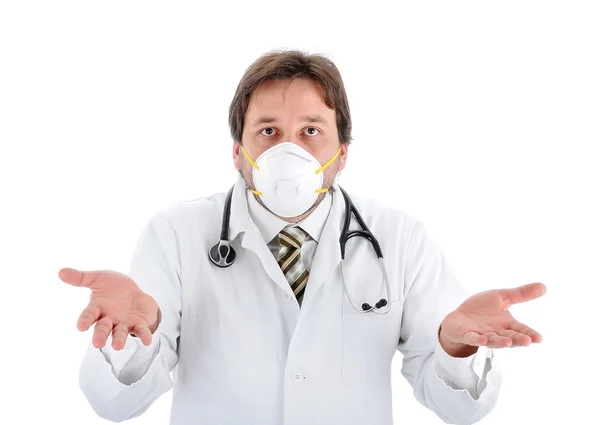 Jonge mannelijke arts met een masker geïsoleerd — Stockfoto