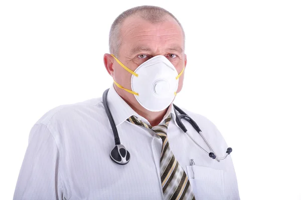 Positive elderly male doctor in characteristic clothes with a mask on face — Stock Photo, Image