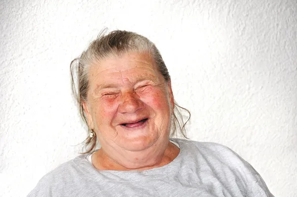 古い高齢女性の人、非常に楽しいと面白い顔 — ストック写真