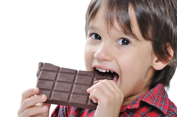 Sehr nettes Kind mit Schokolade, isoliert — Stockfoto