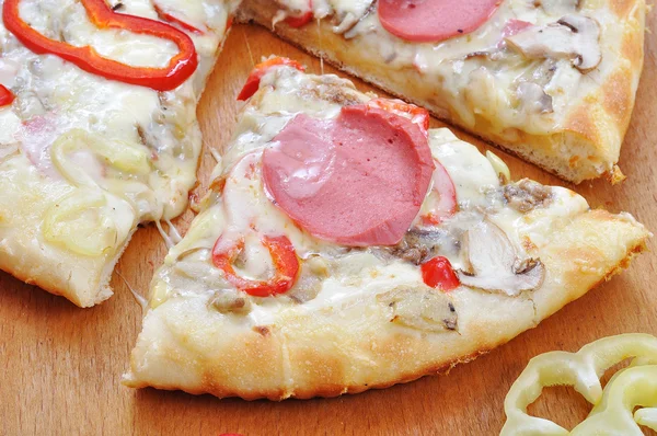 A hot, delicious pizza with hot and bubbly cheese — Stock Photo, Image