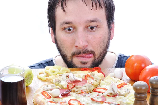 Vuxen person med förvånade ansikte på pizza bord — Stockfoto