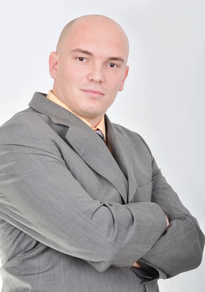 Fiatal, vonzó üzletember fehér háttér — Stock Fotó