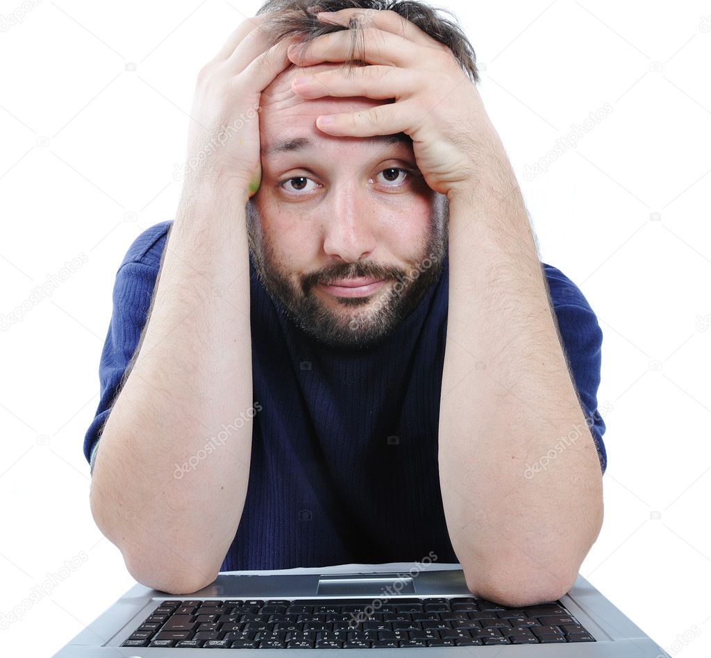 Man looking at computer in desperation