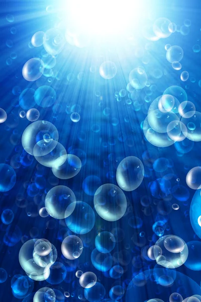 Бульбашки у блакитній воді — стокове фото