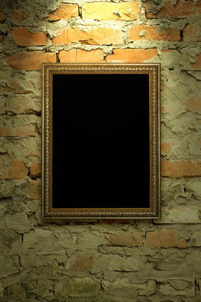 Old frame hanging on the wall — Stock Photo, Image