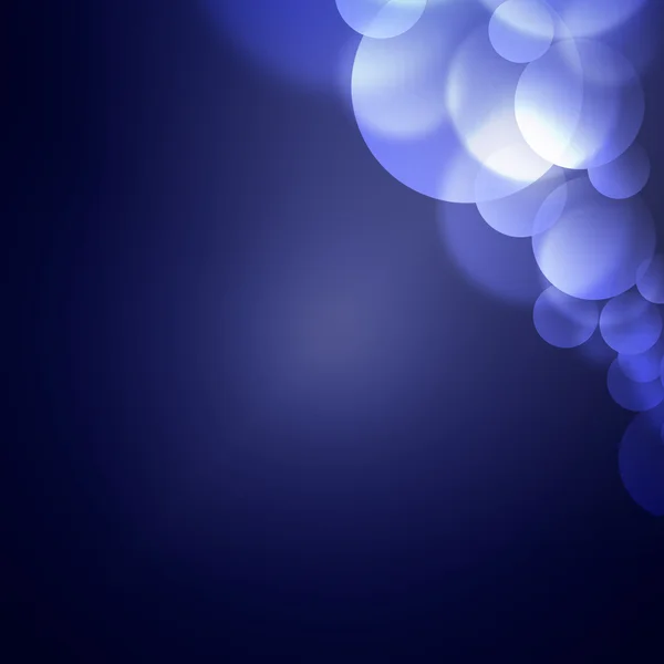 Blaue Kreise auf dunklem Hintergrund — Stockfoto