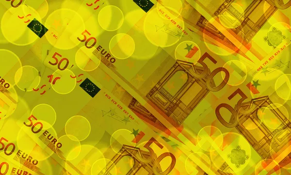 Банкноты евро на абстрактном фоне — стоковое фото