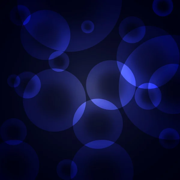 Círculos azuis em um fundo escuro — Fotografia de Stock