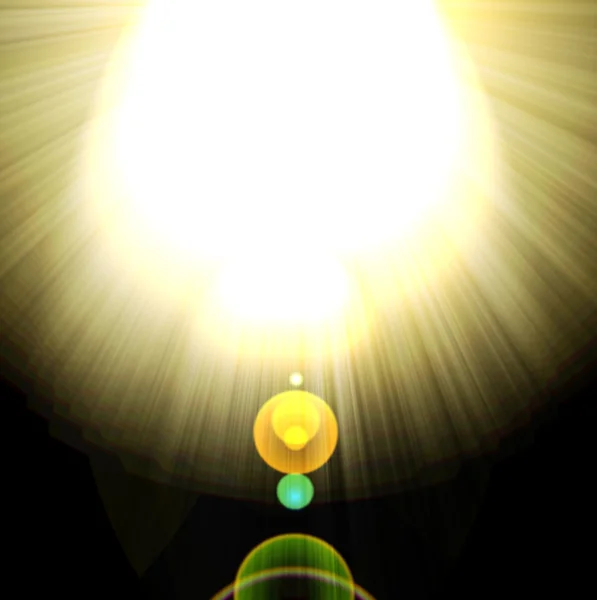 Shining rays of glare on a dark background — Stock Photo, Image