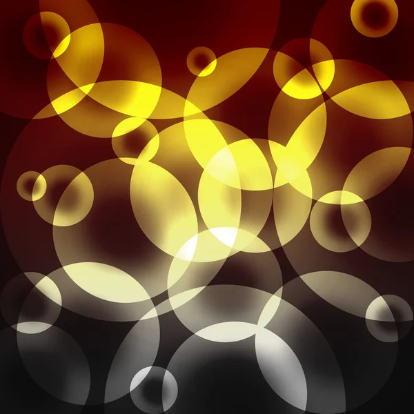 Círculos amarelos em um fundo escuro — Fotografia de Stock