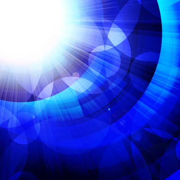 Blauwe cirkels met heldere stralen van licht — Stockfoto