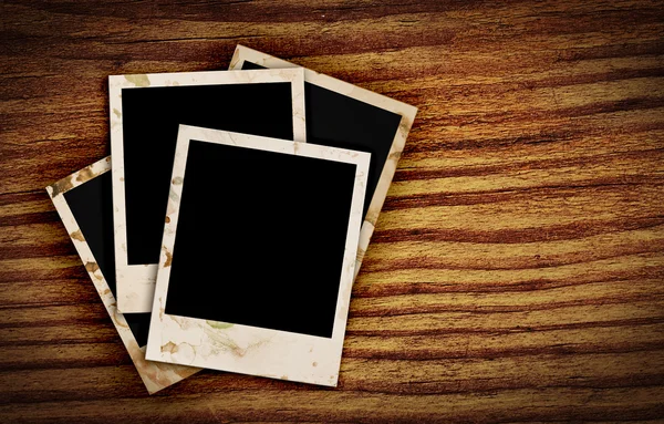 stock image Old photo frames on wood background