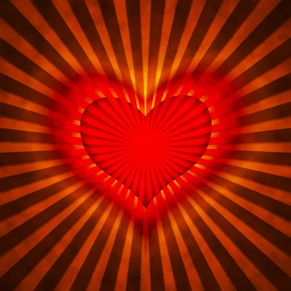 Coeur rouge avec des rayons sur un fond grunge — Photo