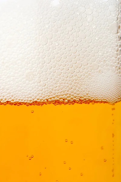 Closeup beer with foam — Stock Photo, Image