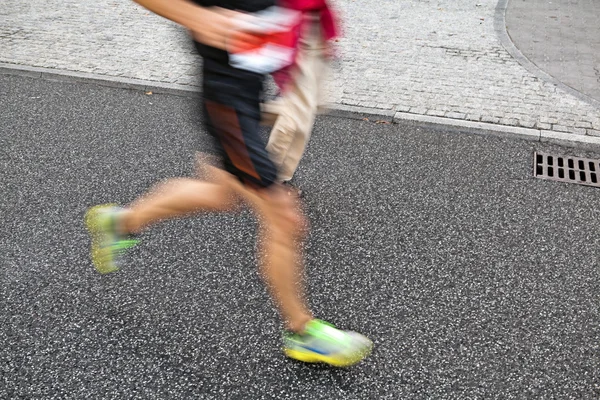 Running marathon motion blur — Stock Photo, Image