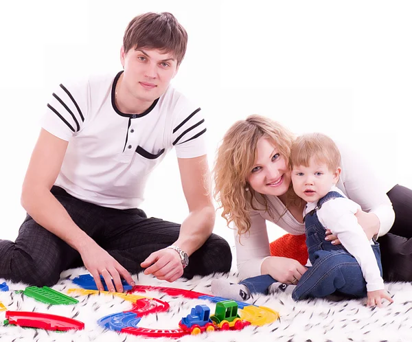 Family with baby boy on white background — Stock Photo, Image