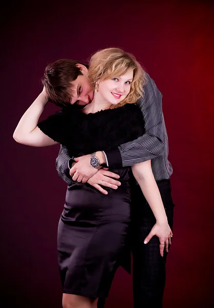 Couple of lover man and woman on dark background. — Stock Photo, Image