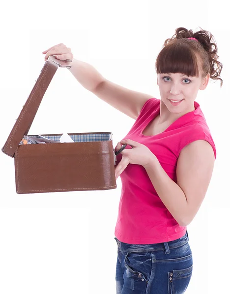 Beautiful young fashion woman opening a suitcase — Stock Photo, Image