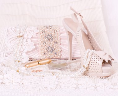 The beautiful bridal shoes, lace and beads clipart