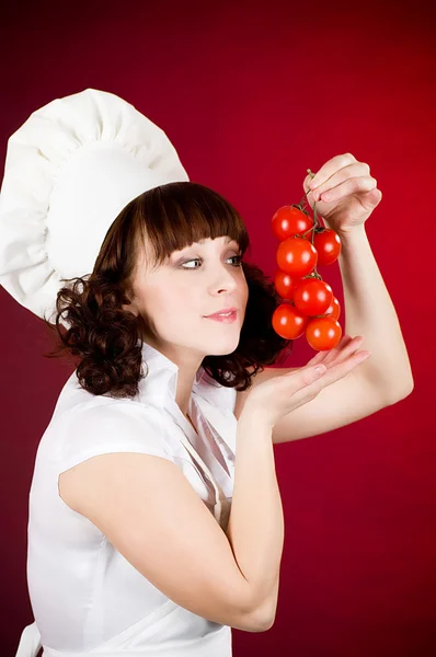 Smiling happy cook woman with vegetables — Stock Photo, Image