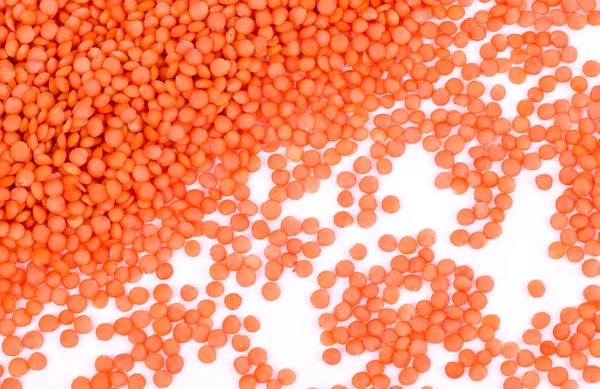 Red lentils on white background — Stock Photo, Image