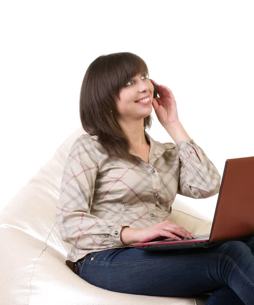 Woman with laptop and telephone — Stock Photo, Image