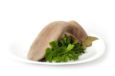 Tasty boiled beef tongue with dill on a white background clipart