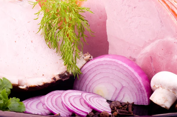 Tasty smoked meat set with red onion — Stock Photo, Image