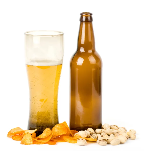 Beer green bottle and potato chips, pistachios — Stock Photo, Image