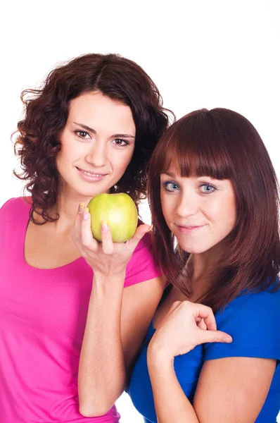 Chicas con manzana sobre fondo blanco — Foto de Stock