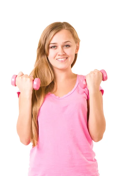 Spor salonunda ağırlık ile gülümseyen kız — Stok fotoğraf