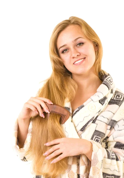 Usměvavá dívka s hřebenem — Stock fotografie