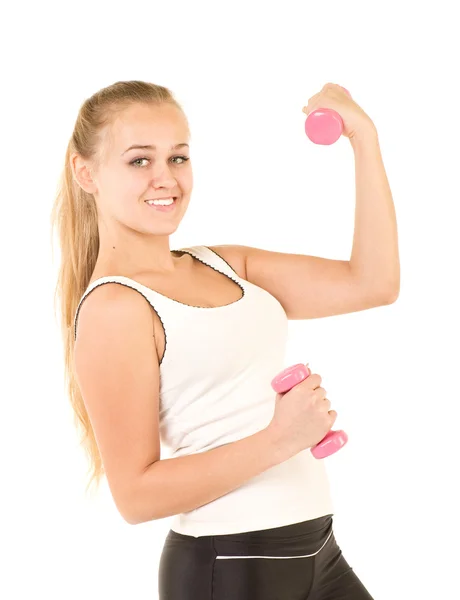 Vackra leende flicka med fria vikter i gymmet — Stockfoto