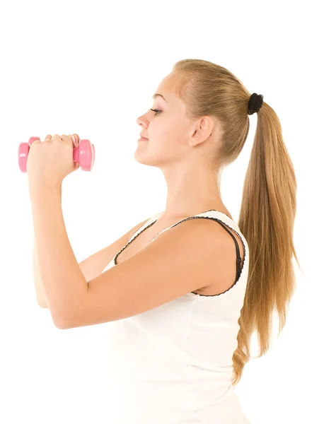 Mooi lachende meisje met vrije gewichten in gym — Stockfoto