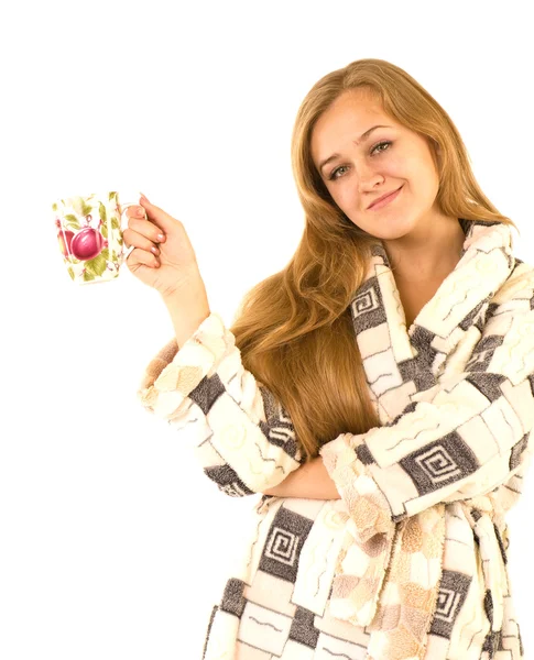 Schönes lächelndes Mädchen mit einer Tasse — Stockfoto