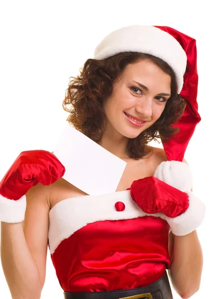 Mulher em roupas de Papai Noel inclinando-se na placa em branco — Fotografia de Stock