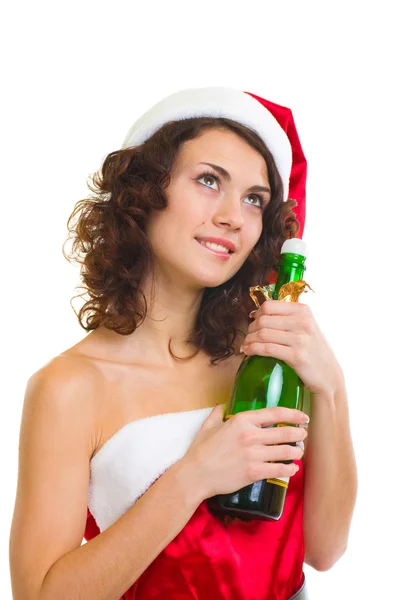 Vrouw in santa claus kleren met champagne fles — Stockfoto